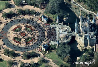 Oblique aerial view of Walt Disney World crowd and Cinderella's Castle -- 13 December 2017